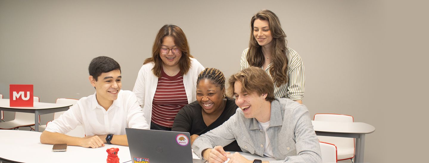 Refer a Friend mdub five friends studying together laptop