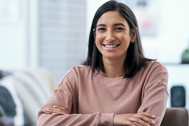 Happy woman studying at home