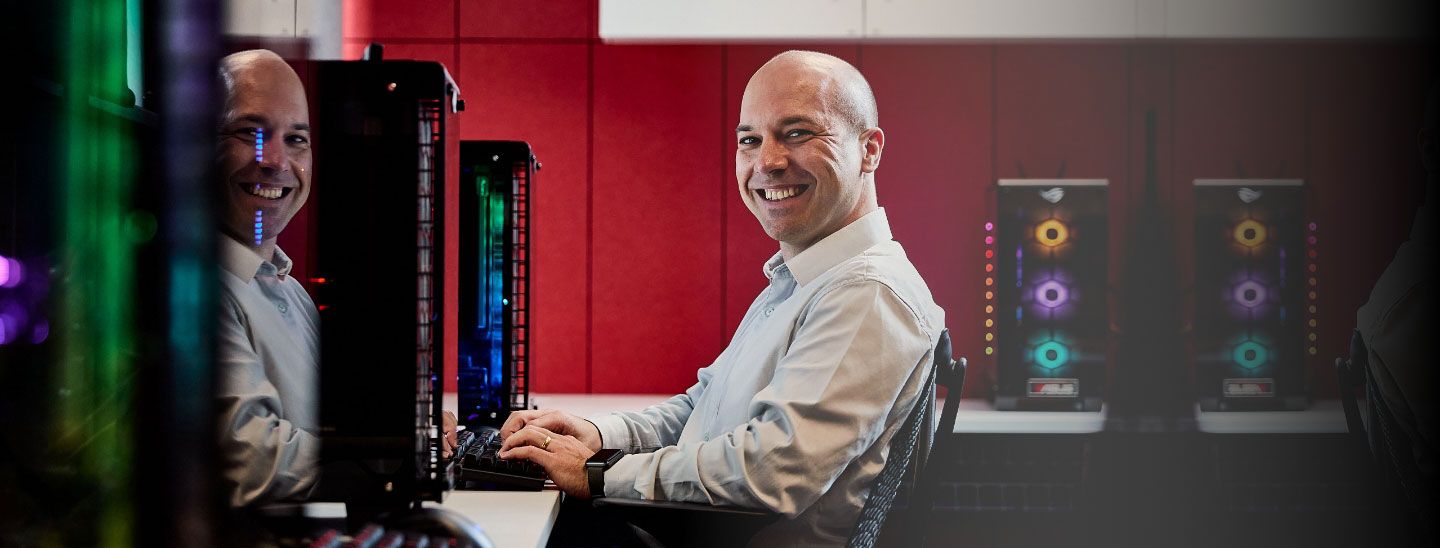 Man happy working in office