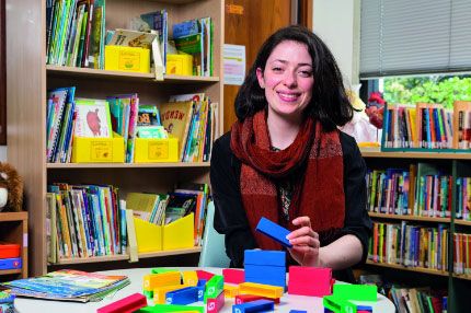 Woman smiling in playroom